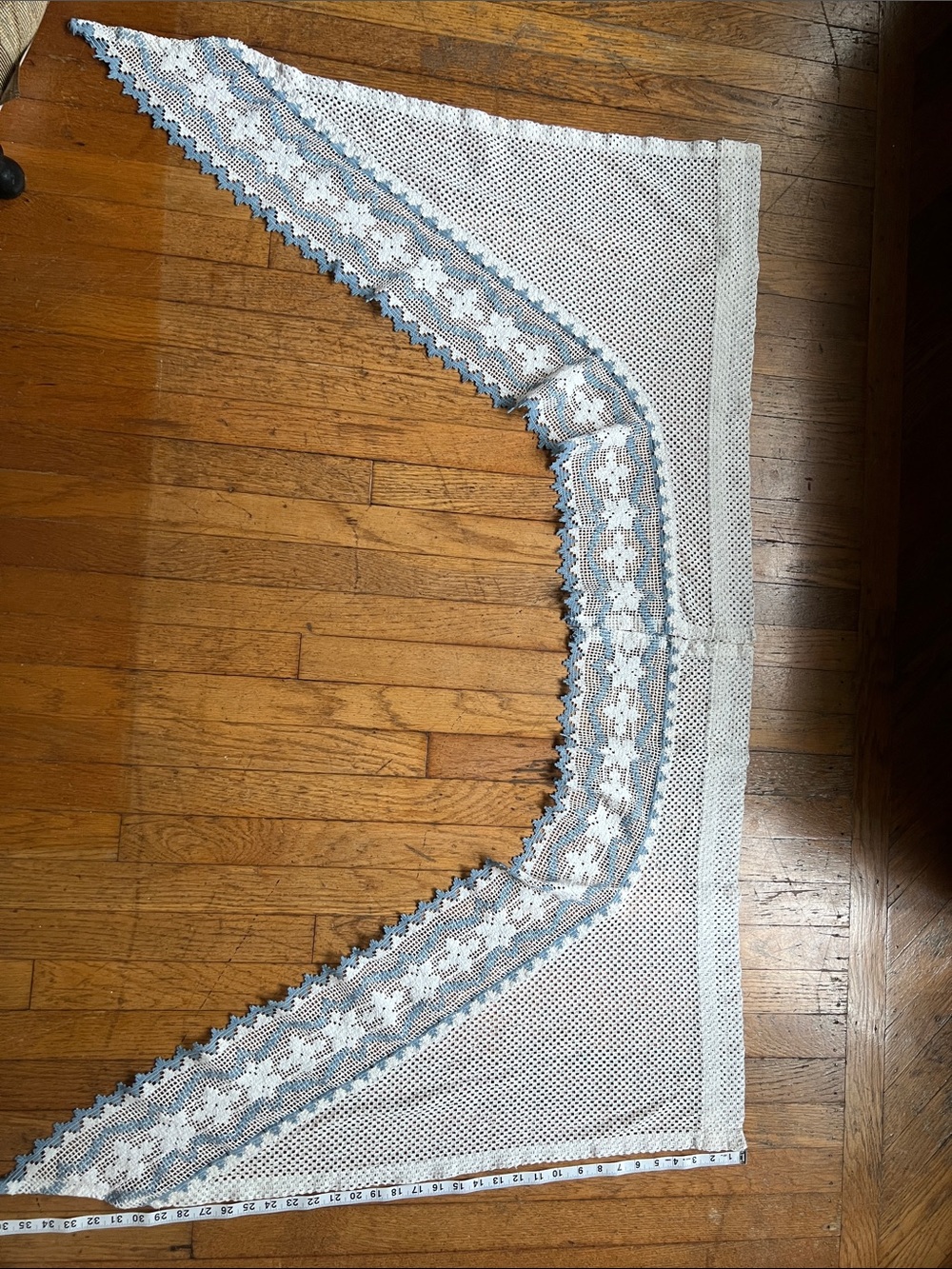 Set of curtain swags with Blue Trim.
